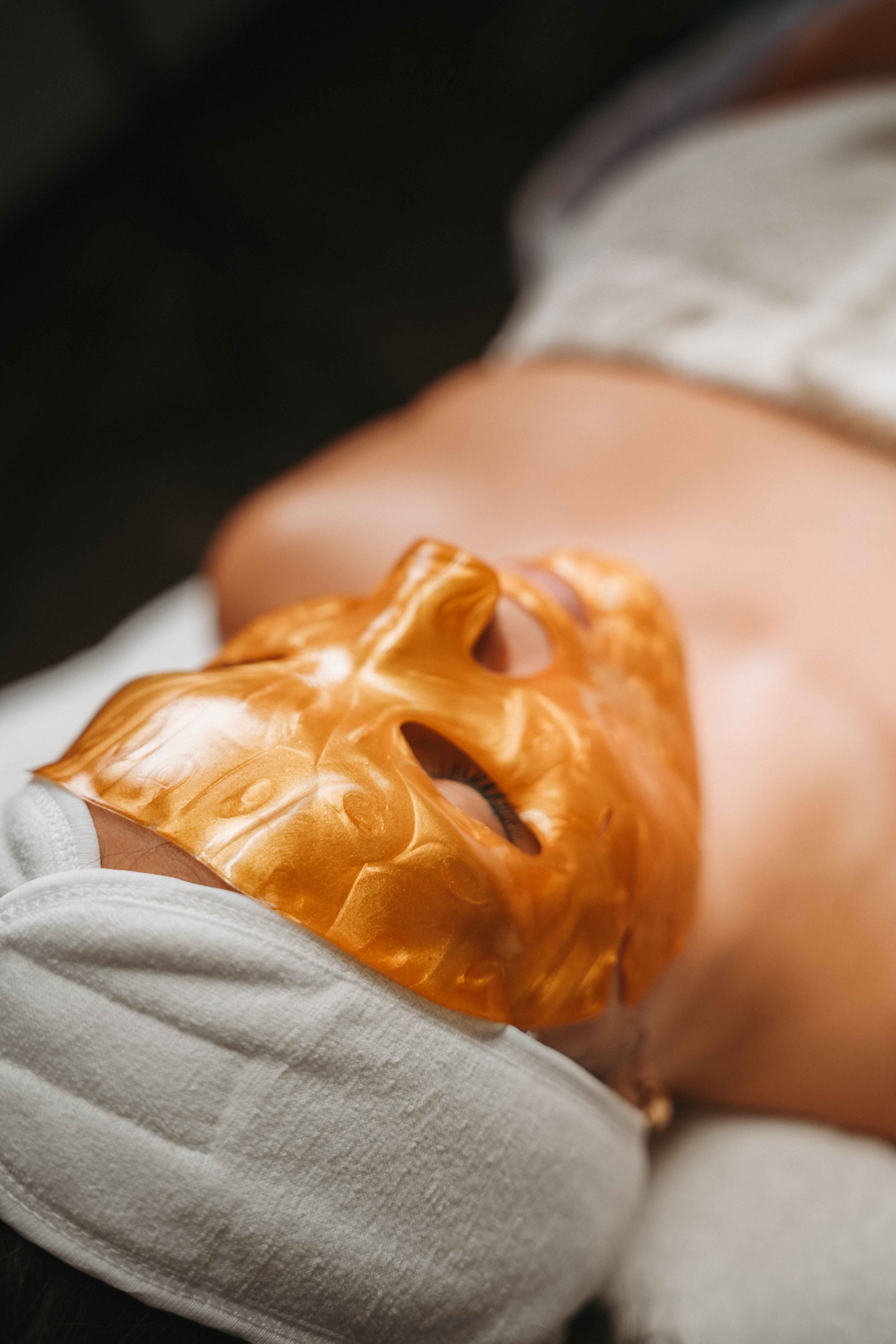 Luxurious gold facial mask treatment at Liv Medspa Denver