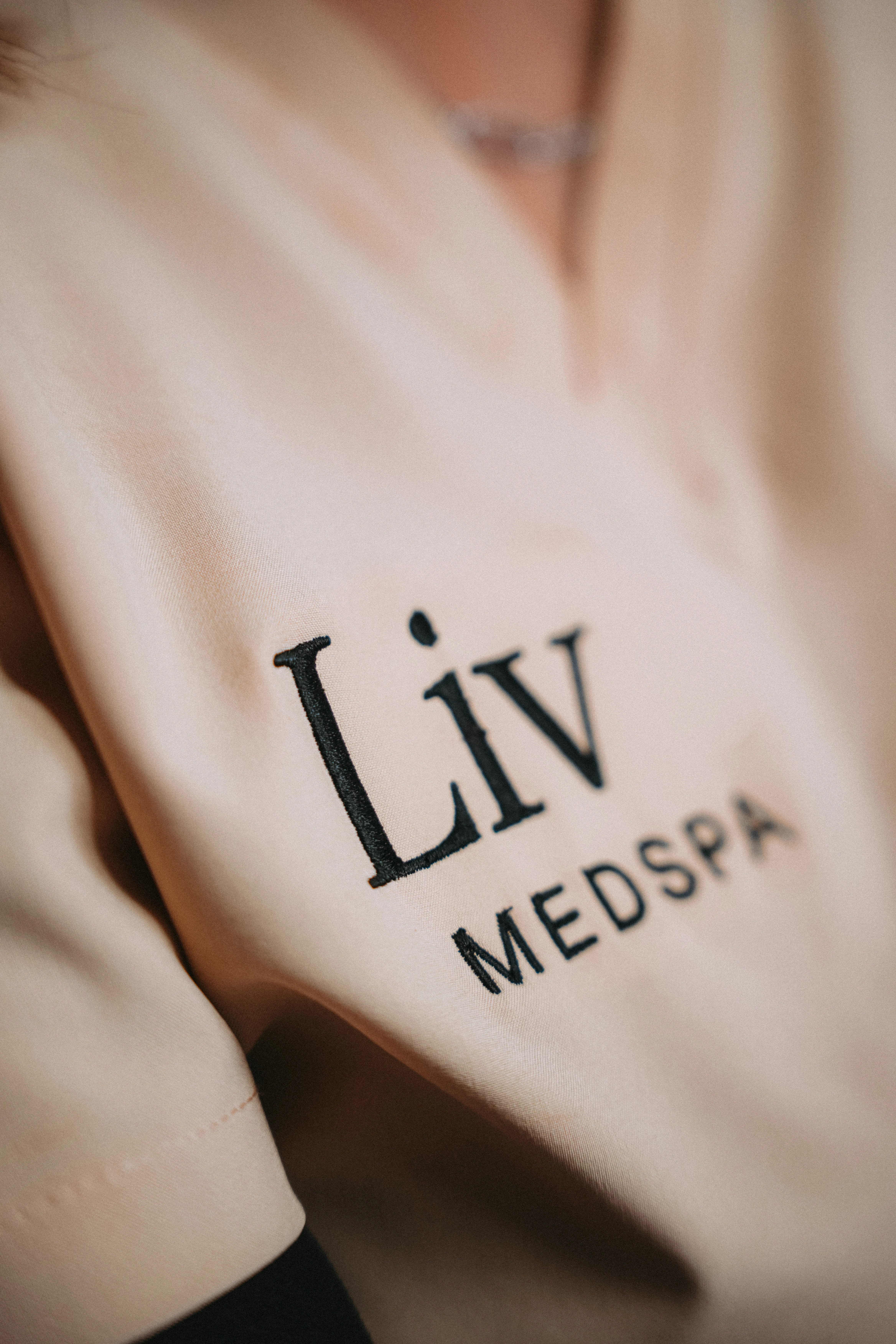 Liv Medspa uniform logo